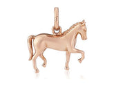 A rose gold charm in the shape of a dressage horse in motion.